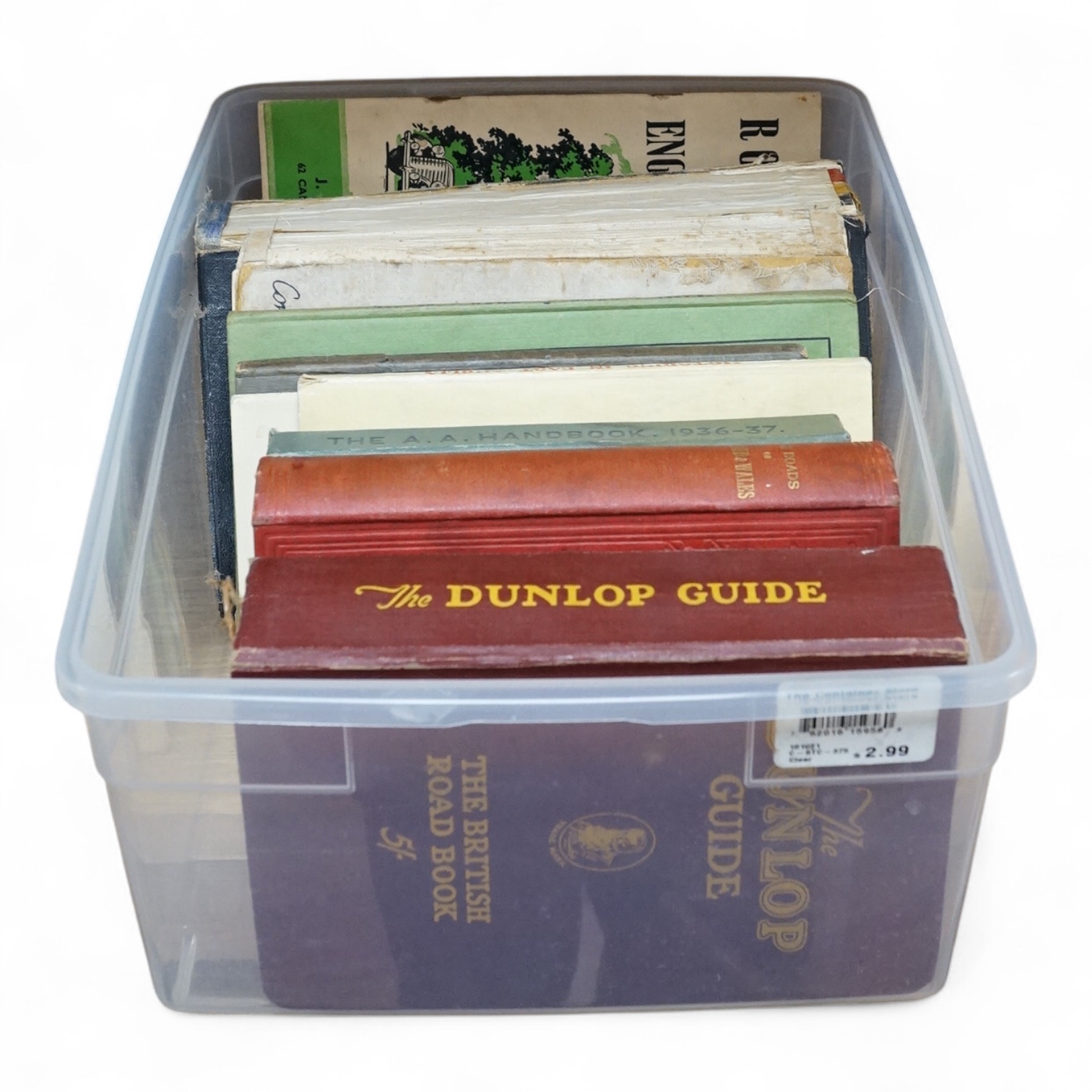 Twelve early motoring road guides (1880s to 1950s) including; a 1920s Dunlop guide, the roads of England and Wales by Charles Howard (1889), the AA Handbook 1936-37, the AA Garage Handbook 1938-39, a road atlas, a 1909 C